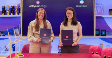 Zoisa North-Bond of Octopus Energy Generation and Angie (Chao) Zhang of Ming Yang Smart Energy sign partnership agreement in London.