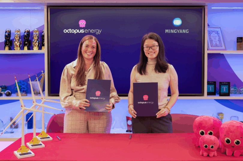 Zoisa North-Bond of Octopus Energy Generation and Angie (Chao) Zhang of Ming Yang Smart Energy sign partnership agreement in London.