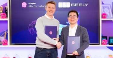 Octopus Electric Vehicles and Geely Auto UK representatives at partnership signing event.