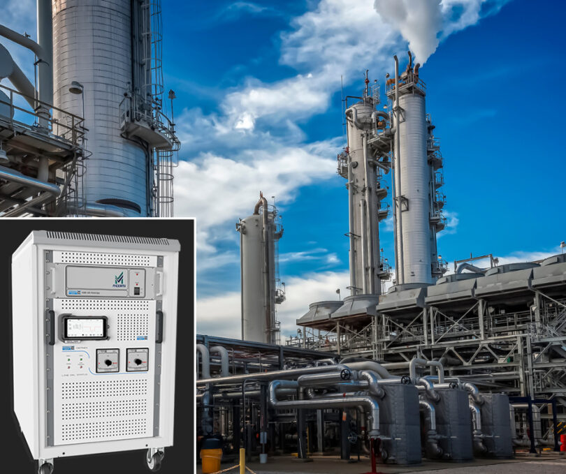 Industrial plant with gas analyser system inset, representing VOC monitoring in sustainable packaging production.