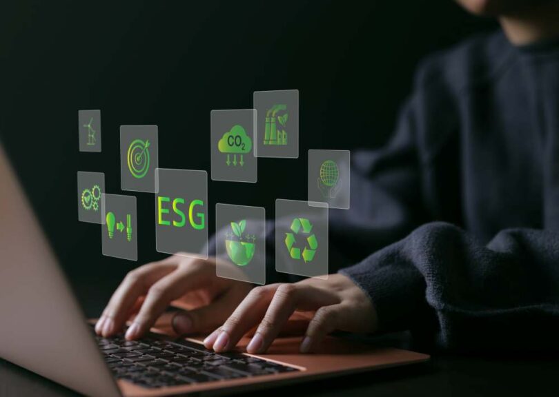 ESG reporting visual showing environmental, social and governance icons displayed on a digital interface