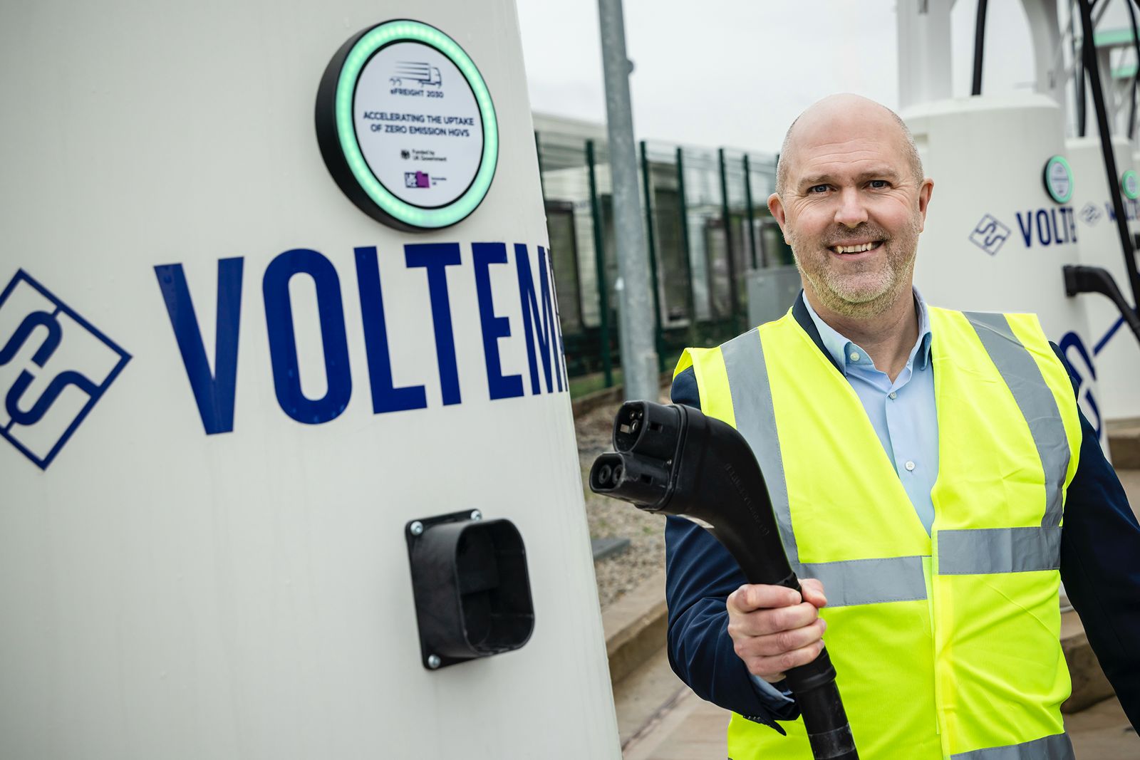 electric HGV charging UK Voltempo CEO Simon Smith with charger