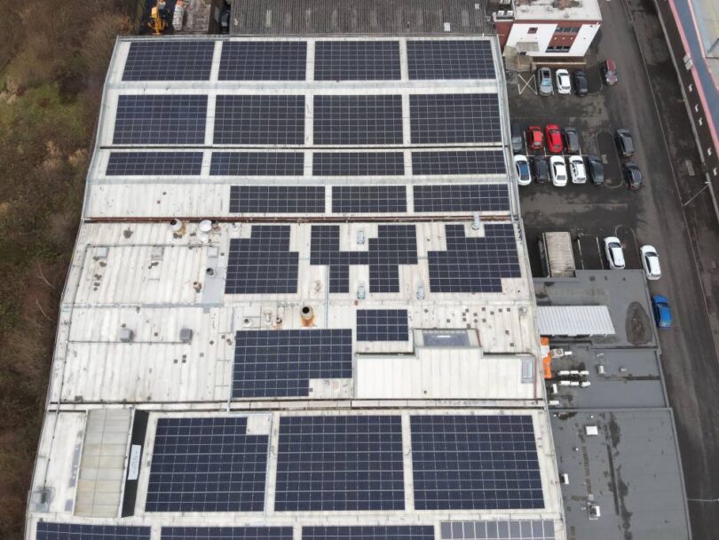 rooftop solar panels installed on industrial building in Glasgow