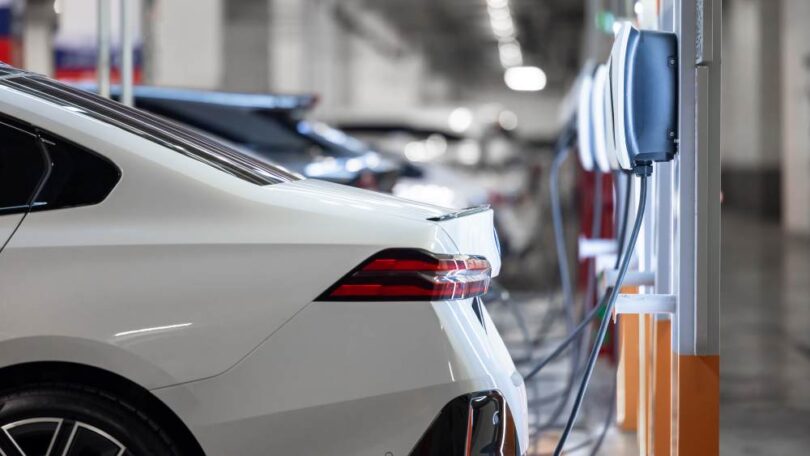 Electric vehicle charging at EV charging station during transition to zero emission transport