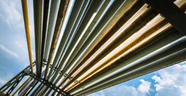 fossil gas pipelines transporting natural gas through industrial energy infrastructure