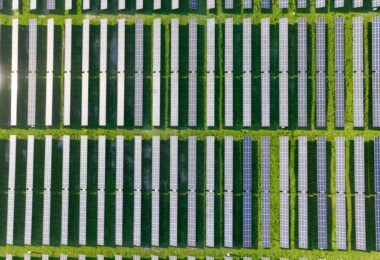 aerial view of solar panels field representing renewable energy projects developed by Matrix Renewables