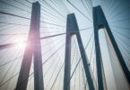 Corrosion impact on infrastructure and sustainability with cable-stayed bridge structure