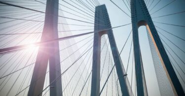 Corrosion impact on infrastructure and sustainability with cable-stayed bridge structure
