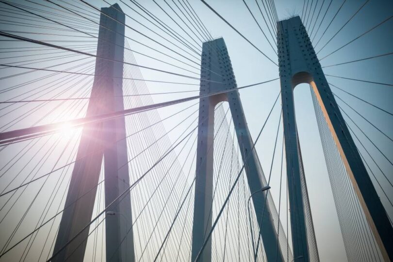 Corrosion impact on infrastructure and sustainability with cable-stayed bridge structure