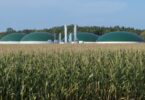 anaerobic digestion renewable natural gas facility beside agricultural crops