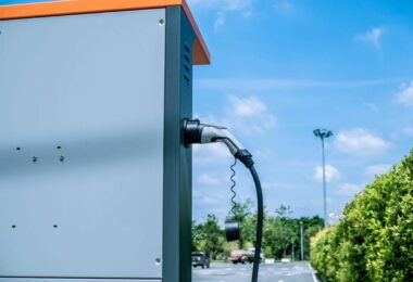 electric vehicle charging station with battery storage infrastructure outdoors