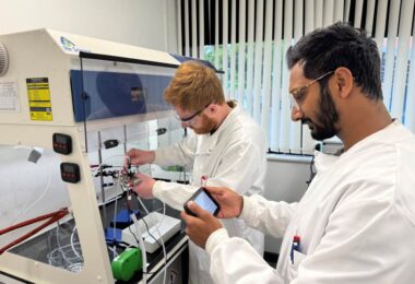 Researchers checking ammonia levels in a Rhizo PTX electrolyser using laboratory analysis equipment