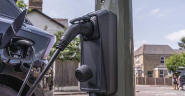 Electric vehicle charging from a lamp column charger on a residential street