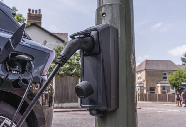 Electric vehicle charging from a lamp column charger on a residential street