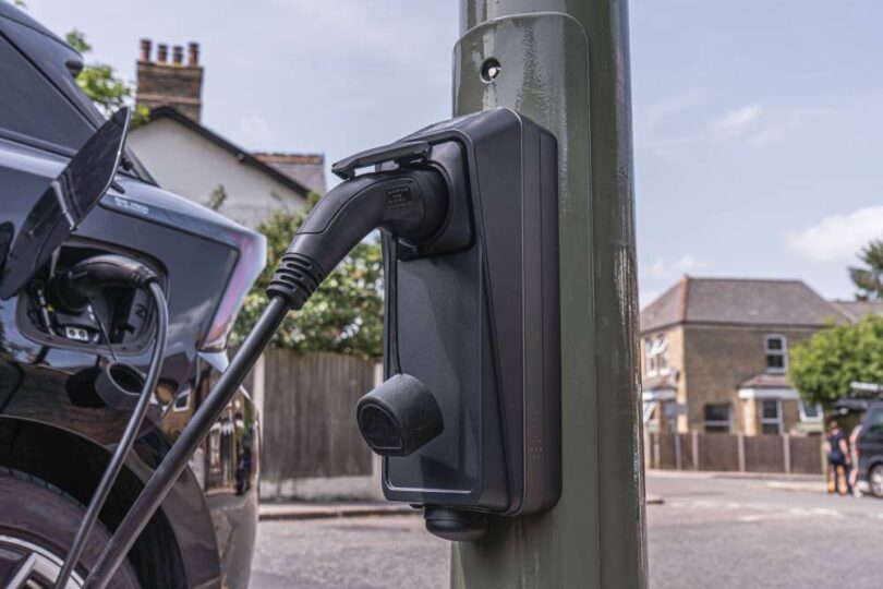 Electric vehicle charging from a lamp column charger on a residential street