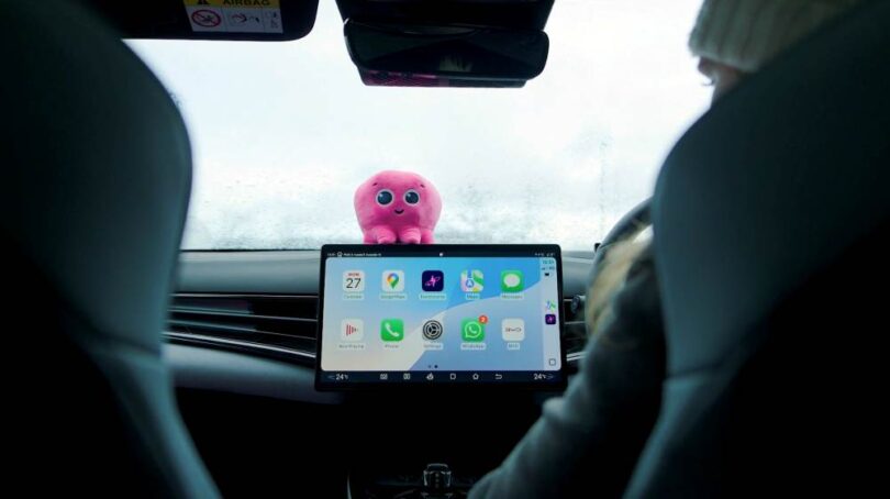 Octopus Electroverse app visible on an electric car dashboard