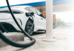 Electric vehicle charging at a public fast-charging station in Europe.