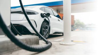 Electric vehicle charging at a public fast-charging station in Europe.