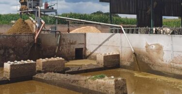 Slurry store and farm mixing equipment at an agricultural site