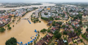 Aerial view of severe flooding across an urban area