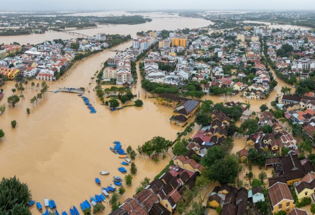 Aerial view of severe flooding across an urban area
