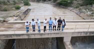 Representatives at the Tinajones water system in Peru