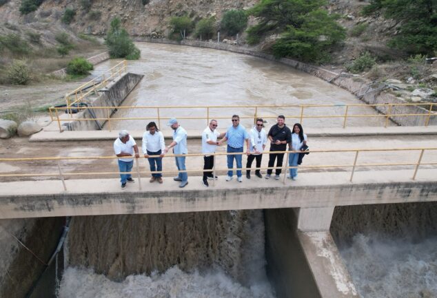 Representatives at the Tinajones water system in Peru